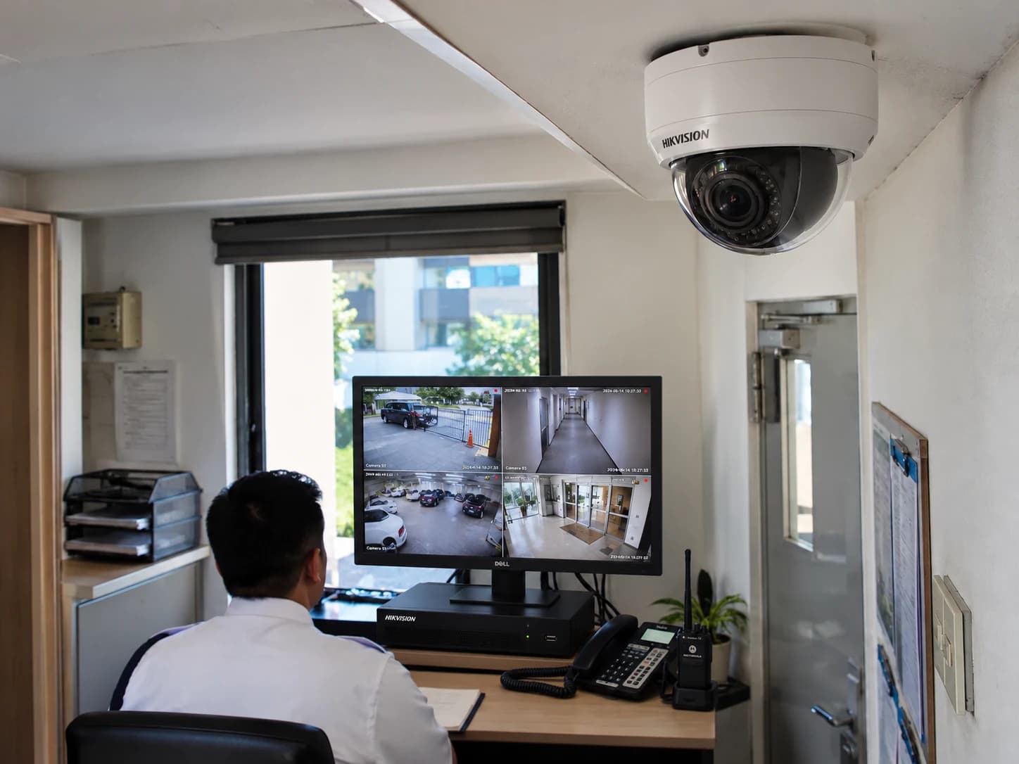 Installed IP dome camera and a building surveillance monitoring station