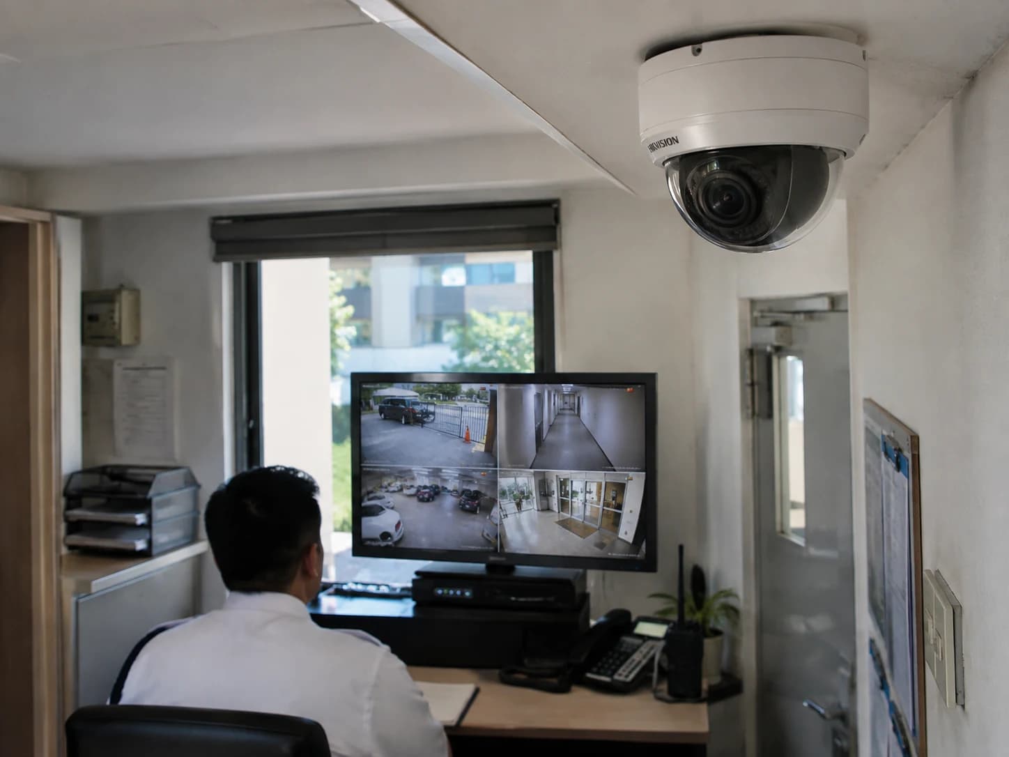 Installed IP dome camera and a building surveillance monitoring station